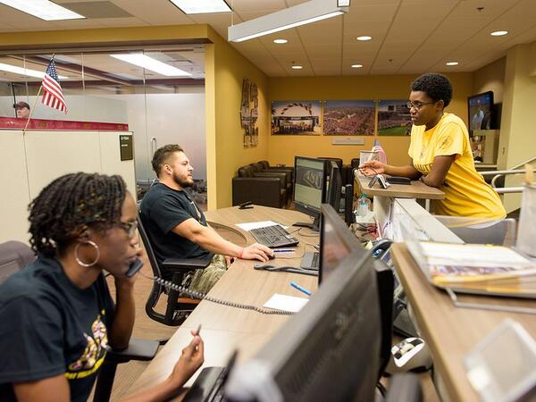 Students working at the veterans center